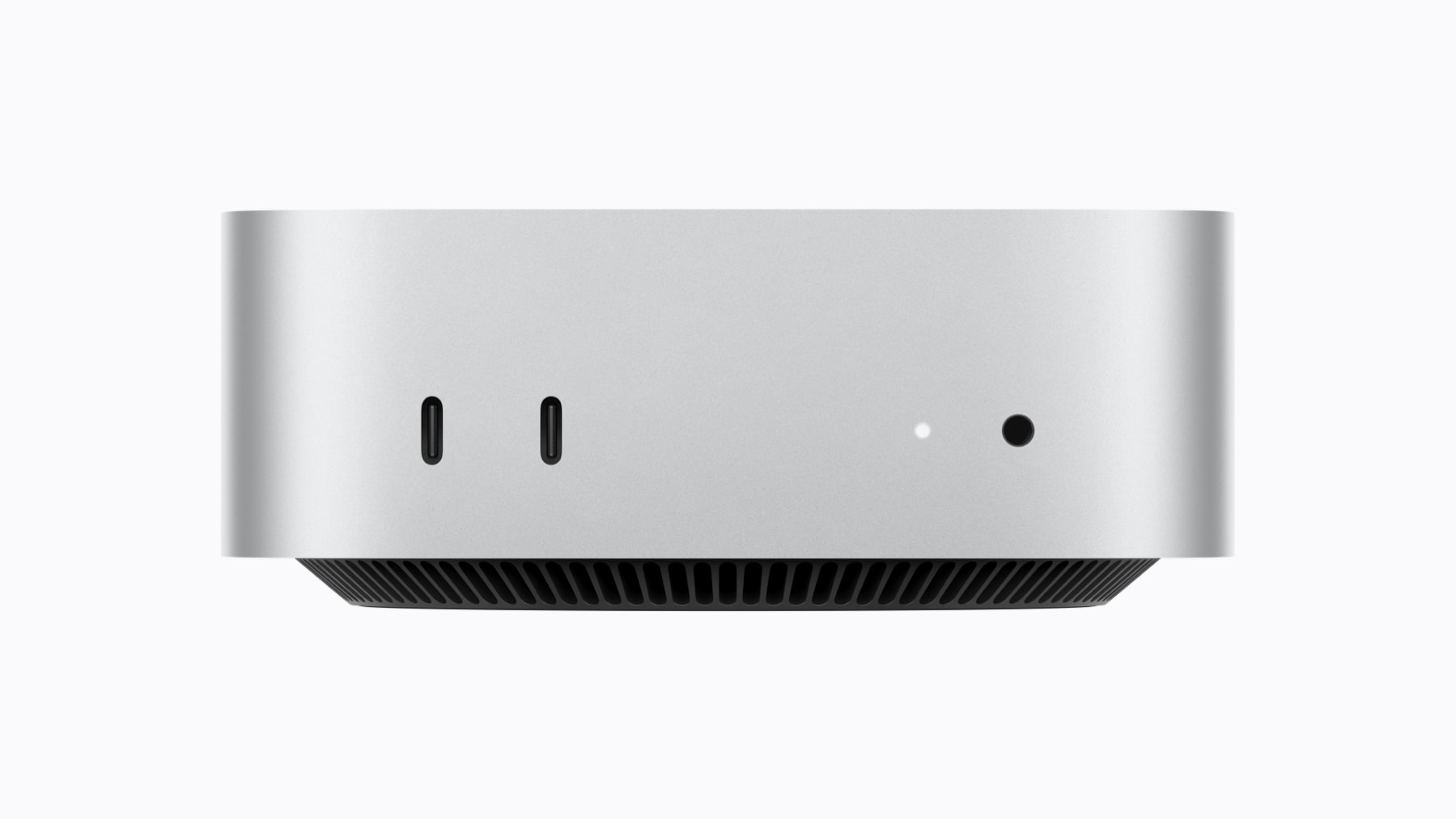 Mac mini 正面，两个支持 USB 3 的 USB-C 接口和耳机孔